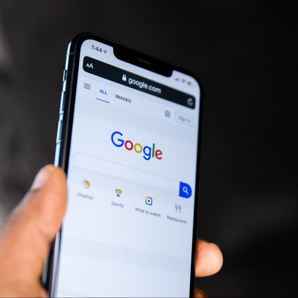 person holding black android smartphone